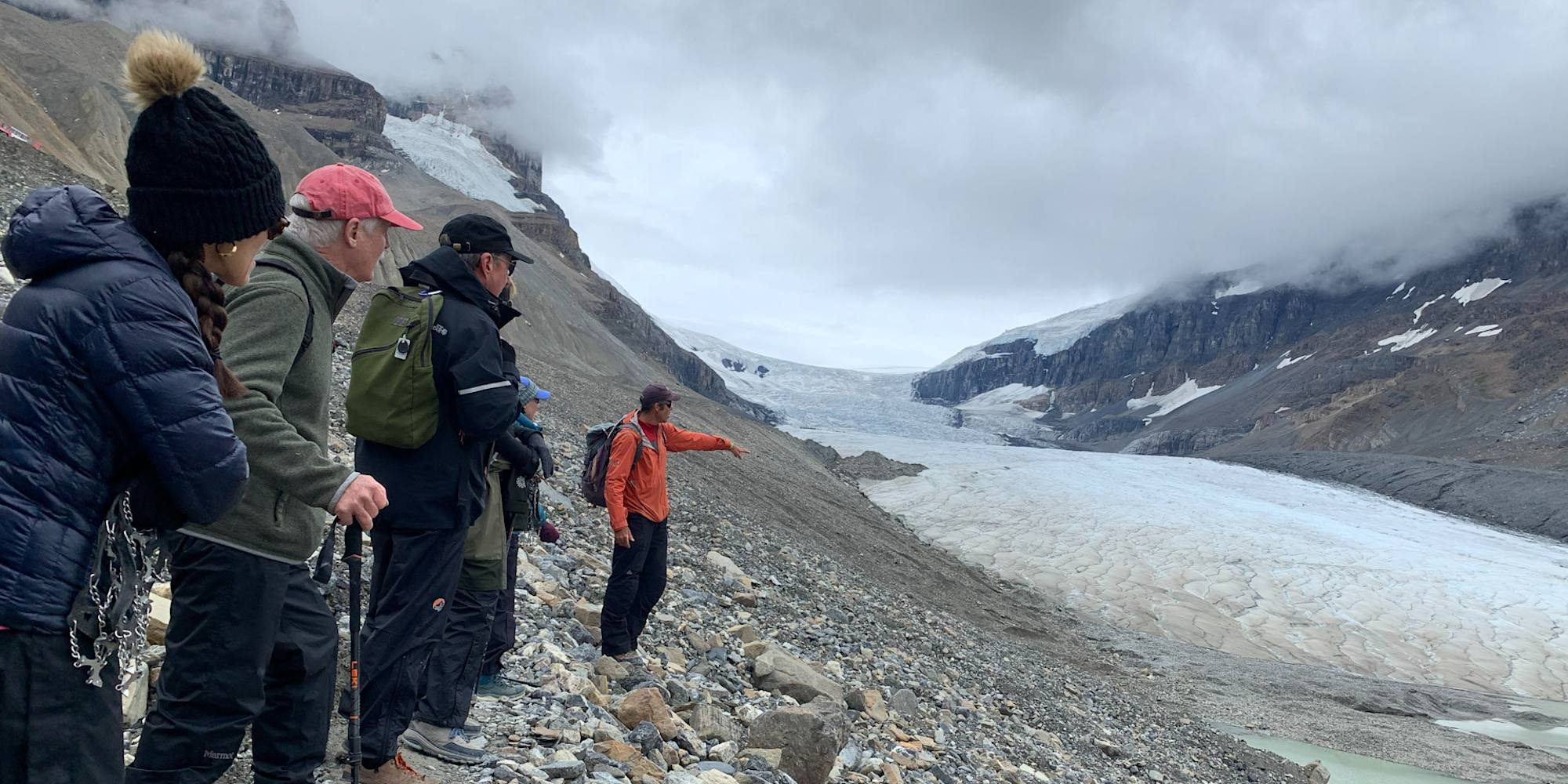 An Austin Adventures Guide giving insights at glacier in the Canadian Rockies